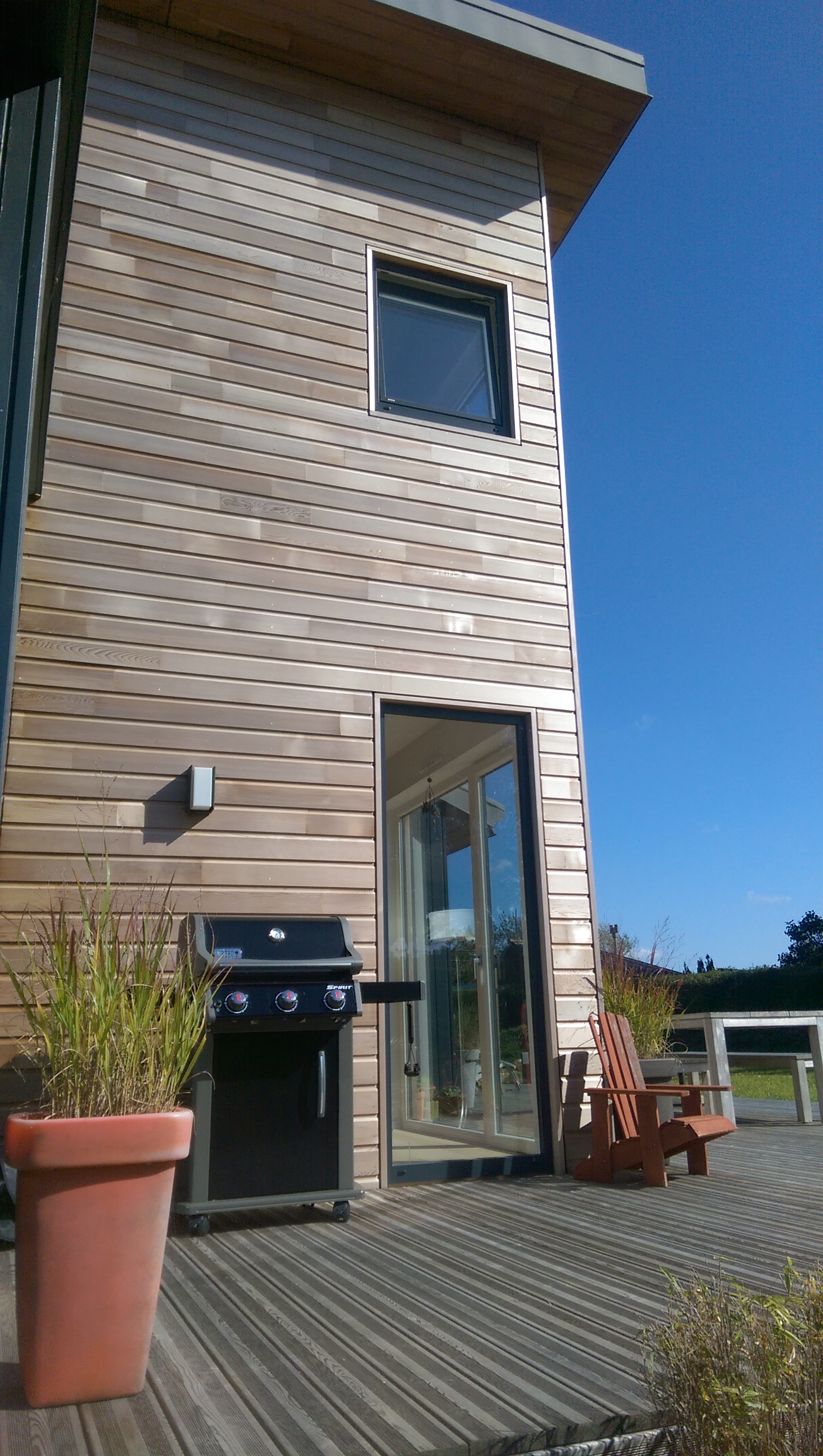 Construction de maisons en bois GLV : maison à étage avec toiture en zinc